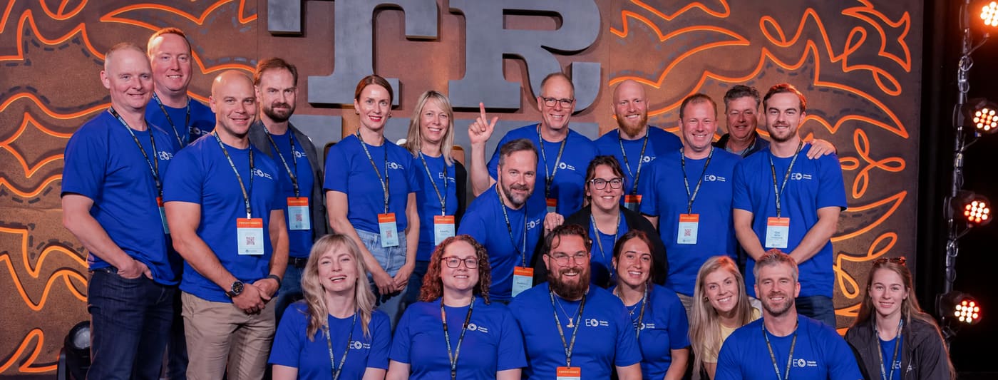 Riley with the Entrepreneurs’ Organization Atlantic Canada chapter, in matching blue shirts
